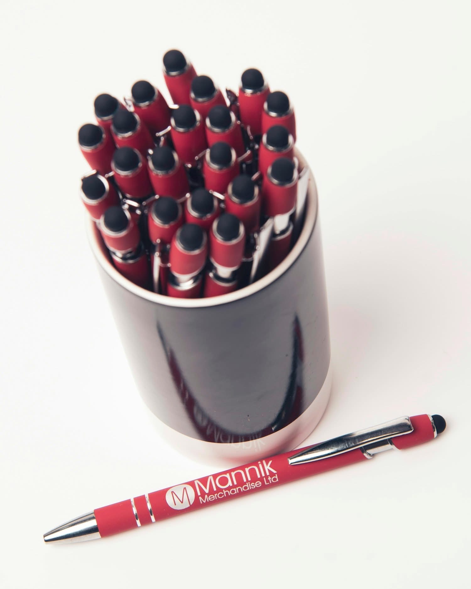 Close-up of printed Mannik pens