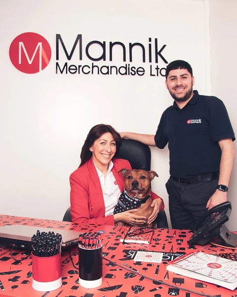 Arlene and Maxx at work in the Mannik office