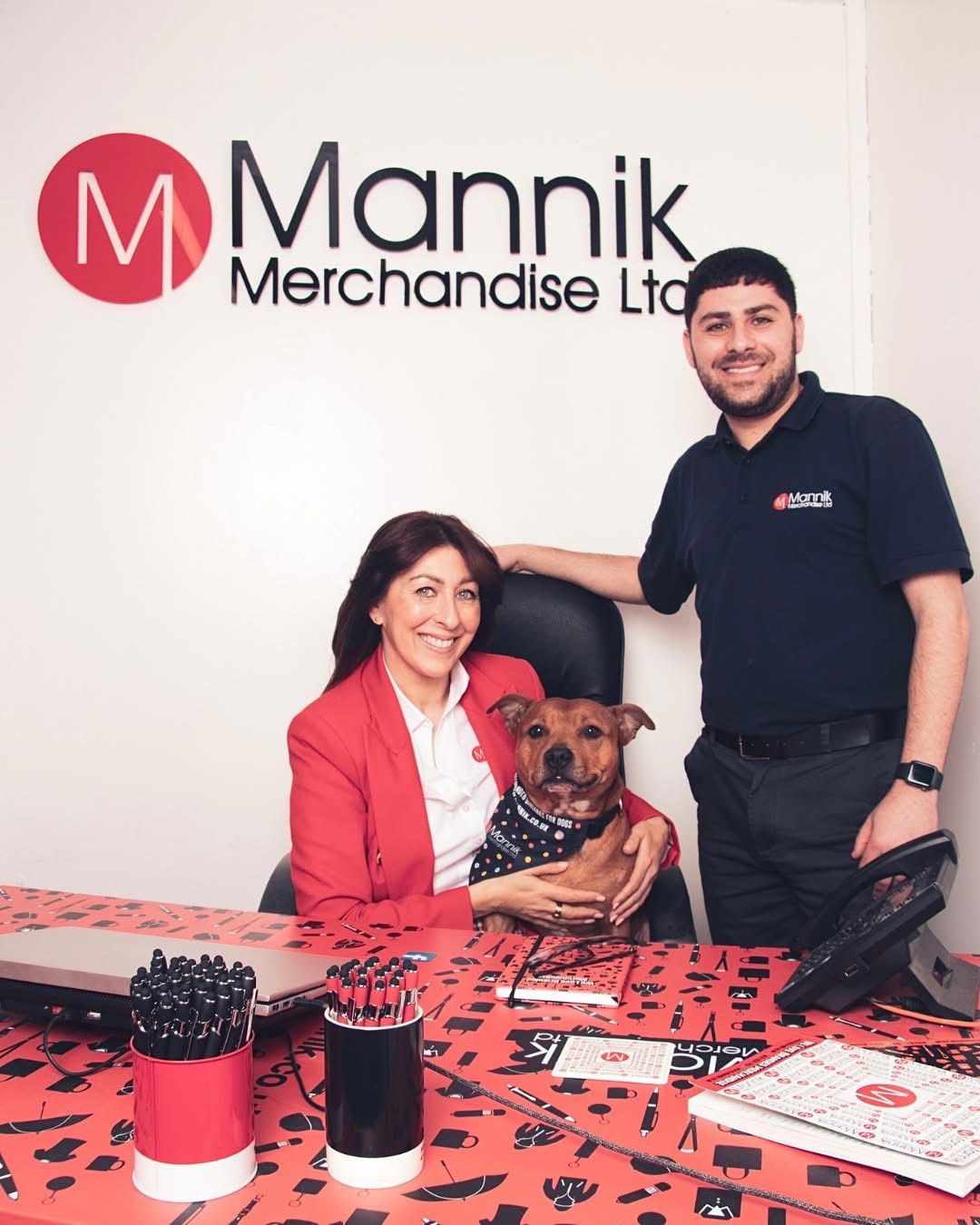 Arlene and Maxx at work in the Mannik office